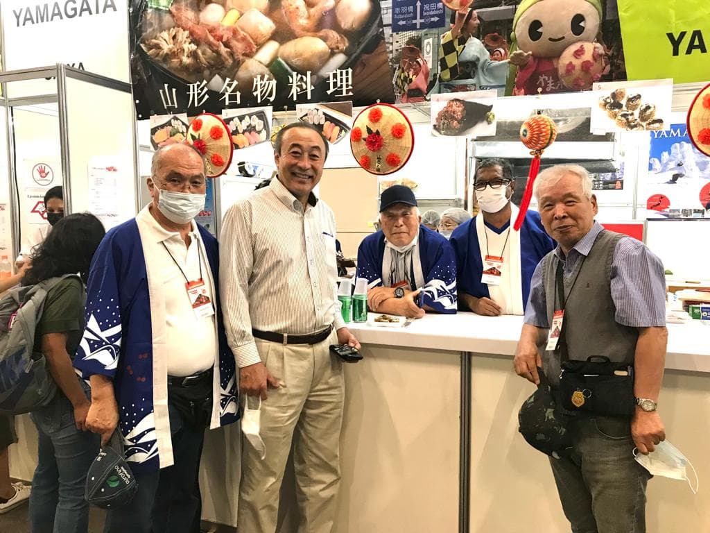 Diretores da Yamagata Kenjin com happi coats no Festival do Japão de 2022